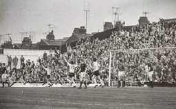 Givens (10) celebrates but Busby's goal is disallowed