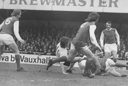 Viv Busby tries to force the ball through