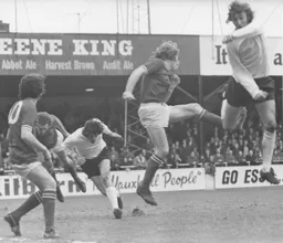 Robin Wainwright attempts to connect with a cross