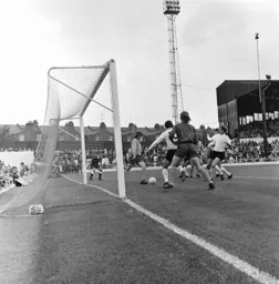 The ball about to be cleared to the unwitting Vic Halom