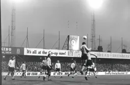 Blues Roger Hynd heads the ball clear