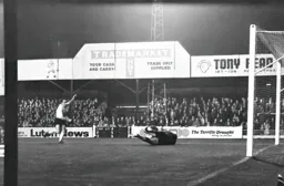 John Aston watches his strike go in