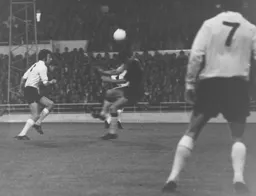 Peter Anderson heads the ball on hoping to find a colleague