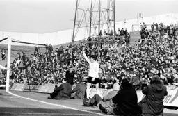 Jim Ryan emerges from the crowd to celebrate his goal