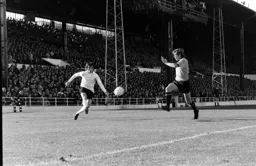 Jim Ryan crosses in front of the expectant Main Stand crowd