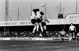 Vic Halom outjumps Rodney Fern and Hull City defence