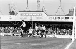 John Aston on his knees
