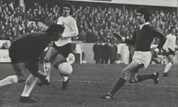 Barry Butlin watches the goalkeeper gather the ball