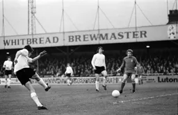 Jim Ryan shoots across the face of goal