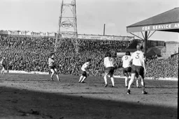 Gordon Hindson gets his shot away in front of 40000 at Burnden Park
