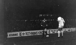 Graham French takes on the Millwall defender