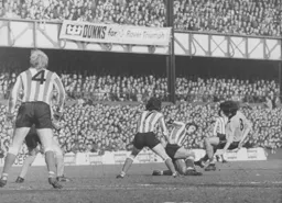 Peter Anderson goes in with a two footed lunge