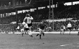 Rodney Fern tries to get his head to the ball