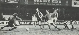Graham Horn dives on the ball