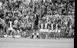 Jimmy Ryan lines up a free kick