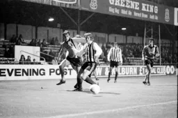 Tom Finney looks for the loose ball
