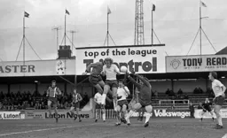 Bolton goalkeeper Barry Siddall makes a save from a close range Barry Butlin header
