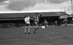 Don Shanks passes the ball back to his goalkeeper