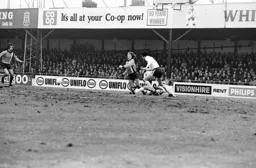 Alan West tackled