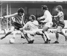 Barry Butlin and Jimmy Husband put pressure on the City defence