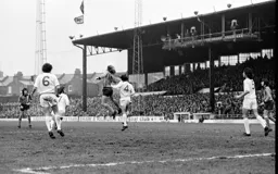 Alan West heads the ball on