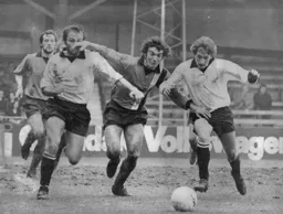 Peter Anderson is sandwiched by two Vale defenders