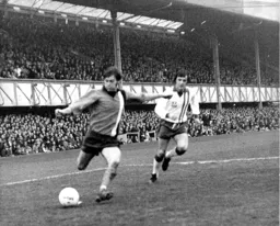 Don Shanks manages to get in a cross