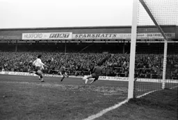 Tom Finney sees his effort saved