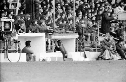 Manager Harry Haslam stares out between the camera positions