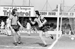 Goalscorer Jimmy Husband is congratulated by Barry Butlin