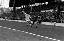 John Aston beats his man