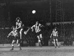 Barry Butlin heads for goal