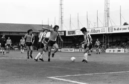 Jimmy Husband moves in on the Saints defender
