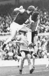 Billy Bonds heads home for the Hammers despite the close attention of Peter Anderson