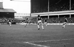 Alan West fires towards goal without success