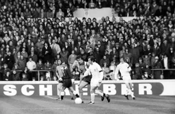 Leeds Jonny Giles tries to go past Peter Anderson