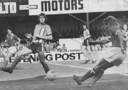 John Ryan attempts to block a centre from Ipswich's Clive Woods
