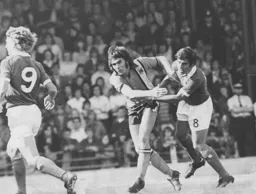 John Ryan is manhandled by Ipswich's Colin Viljoen