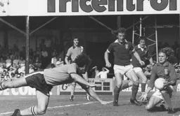Jimmy Husband sees a diving header smothered