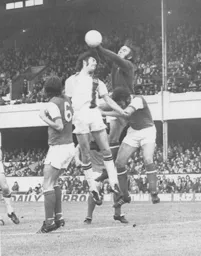 Barry Butlin is beaten by Arsenal's Jimmy Rimmer