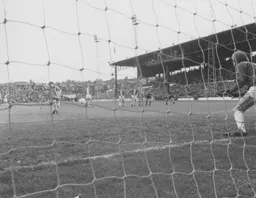 Jim Ryan scores the clinching third goal from the spot