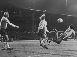 John Aston tries a spectacular diving header