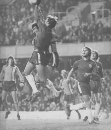 Peter Anderson challenges the Chelsea goalkeeper