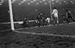 Peter Anderson tries to beat Ray Clemence in goal