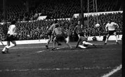 John Aston watches Jimmy Husband’s effort go wide