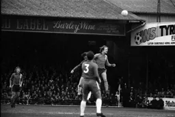 John Faulkner wins the aerial battle watched on by Steve Buckley