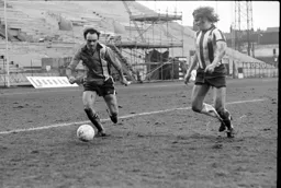 John Aston goes past the building works