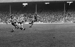 Alan West shoots from outside the box