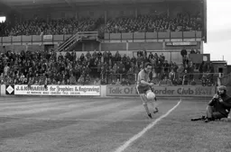 John Aston just manages too keep ball in play