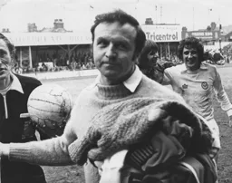 Leeds manager Jimmy Armfield looks glum at the end while Keith Barber jokes with Norman Hunter